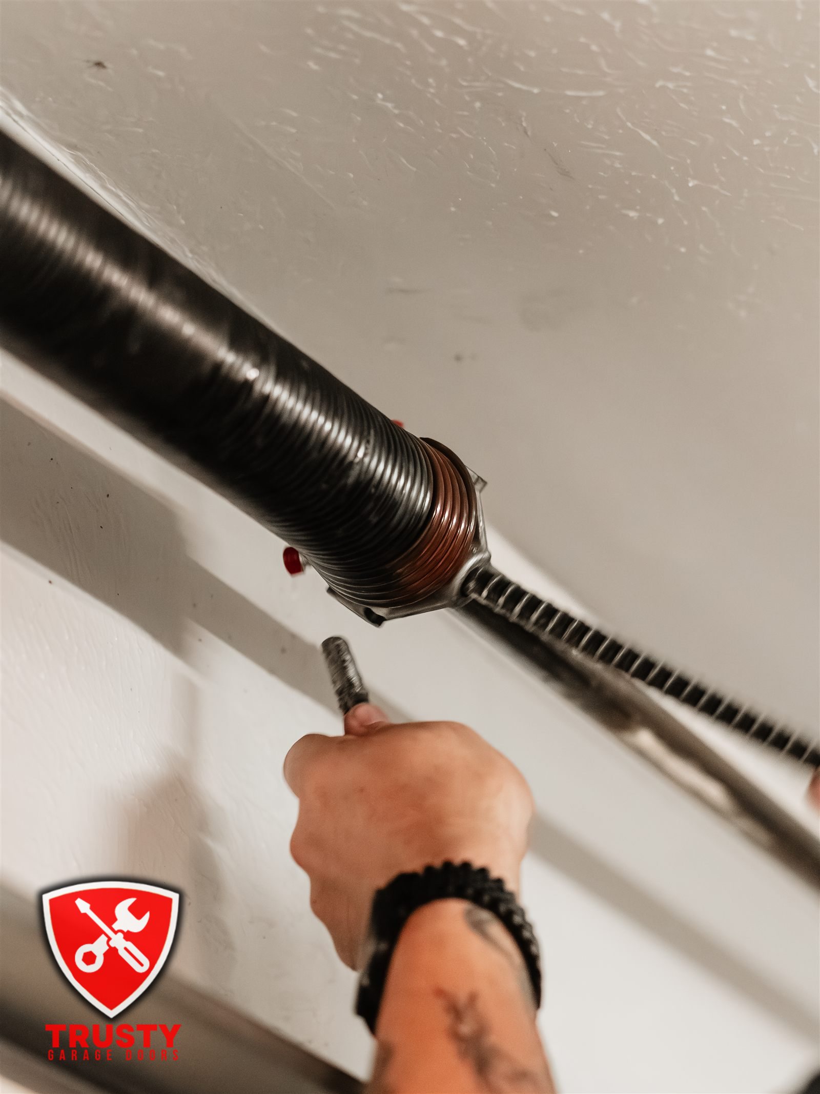 Winding a torsion spring cone in North Richland Hills, TX