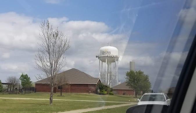 garage door repair celina tx, a water tower in a neighborhood in Celina TX