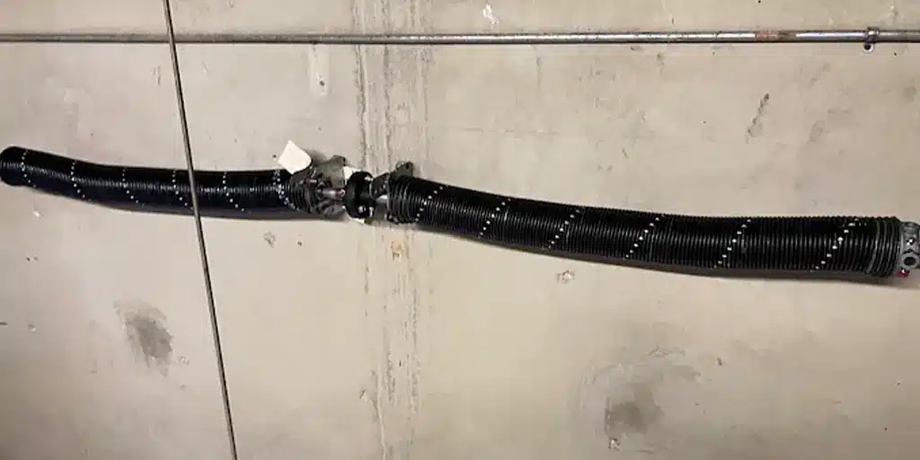 How to Identify a Broken Garage Door Spring Before Disaster Strikes